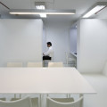 Discussion Table with backdrop of Boss Boxes